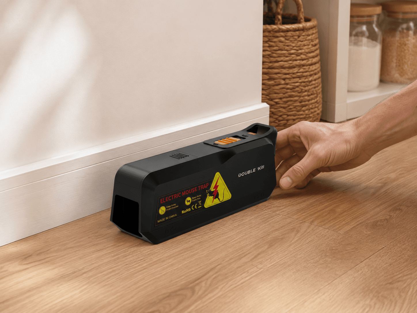 Positioning the complete MK03 electric mouse trap along a wall