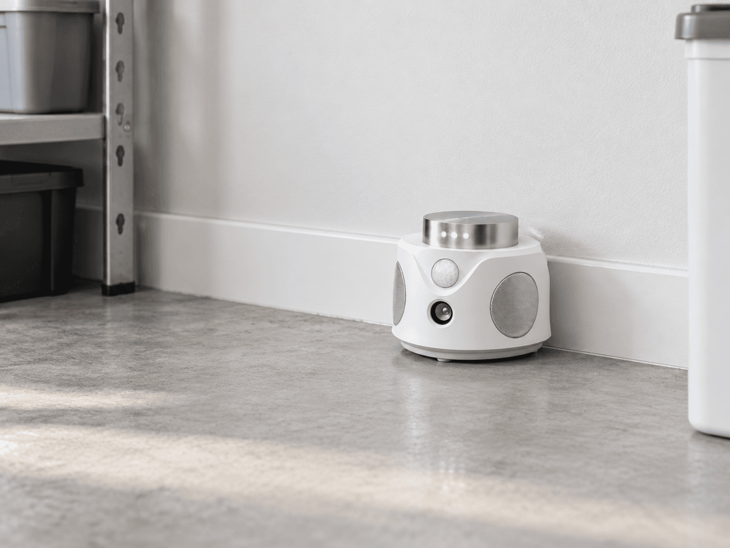 UR02S indoor ultrasonic pest repeller placed in an open room